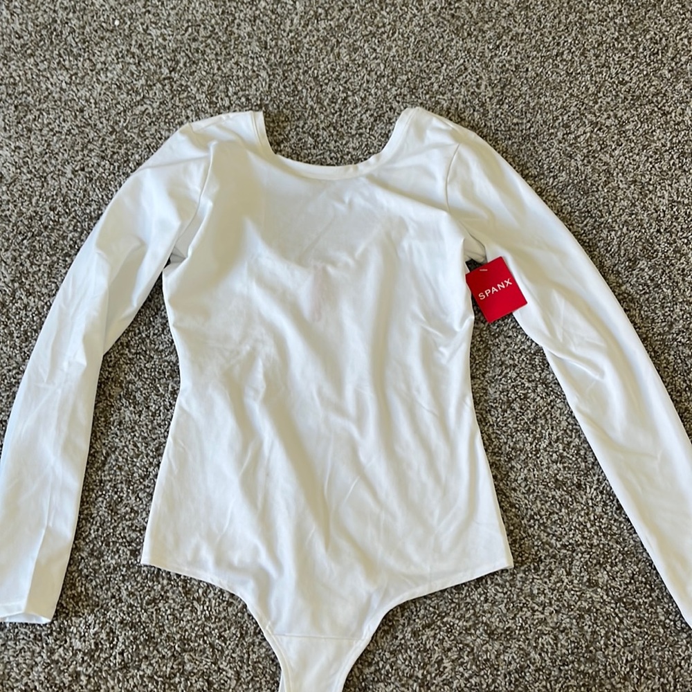 SPANX white long sleeve bodysuit. New with tags
